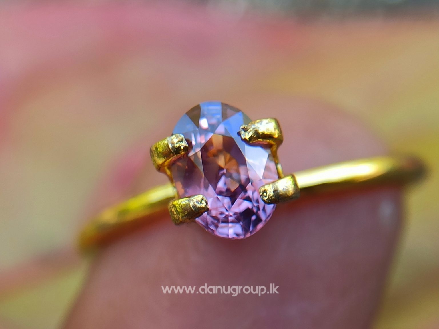 Natural Brownish Purple Sapphire Oval shape gem from Danu Group - danugroup.lk