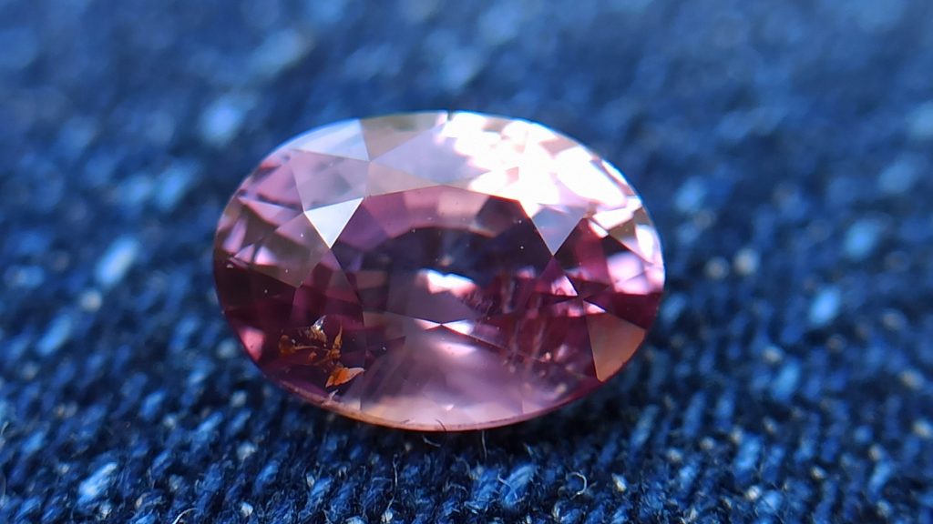 Natural Brownish Purple Sapphire Oval shape gem from Danu Group - danugroup.lk