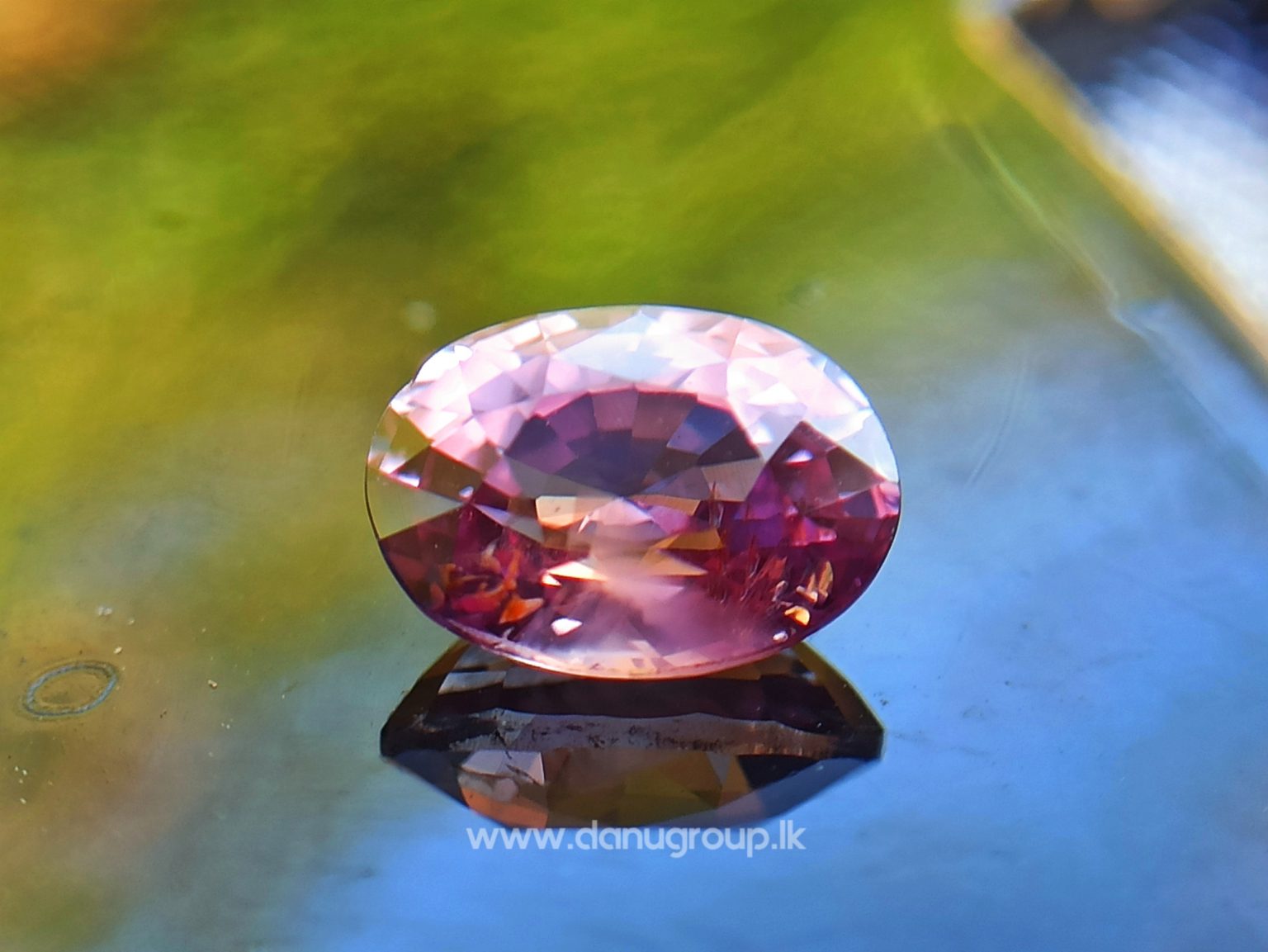 Natural Brownish Purple Sapphire Oval shape gem from Danu Group - danugroup.lk