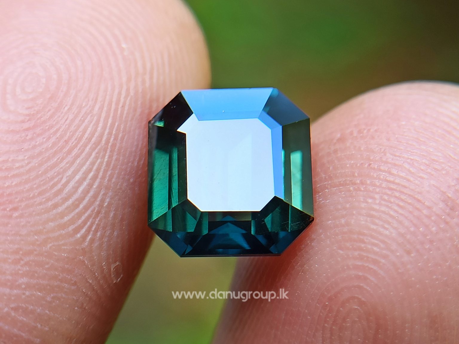 Natural Dark Green Sapphire Unheated Octagon shape stone from Danu Group Gemstones Collections