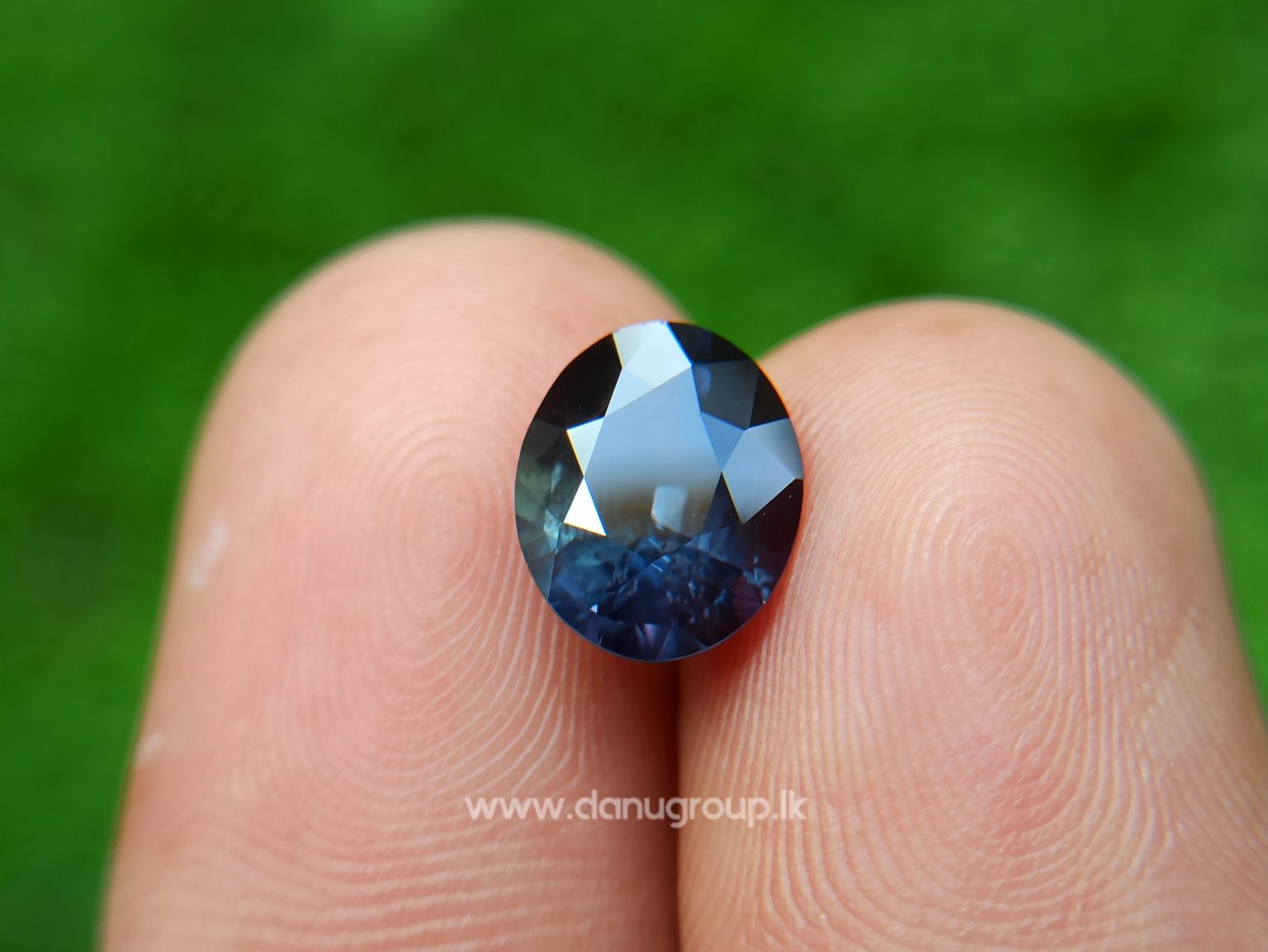 Dark purple sapphire oval shape 2 ct plus gem from Danu Group Gemstones Collections danugroup.lk