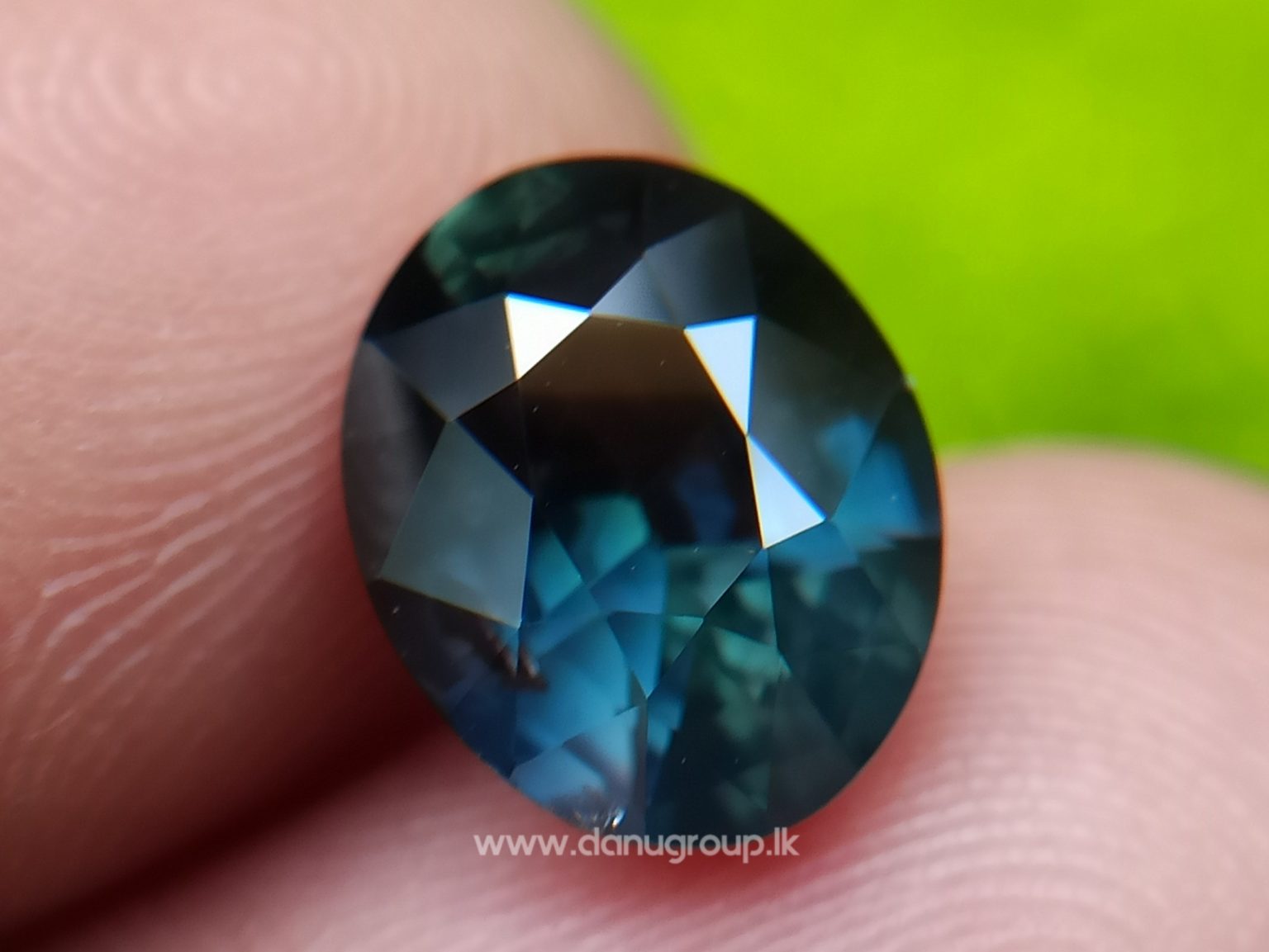 Dark Bluish Green Sapphire from Madagascar Danu Group Gemstones