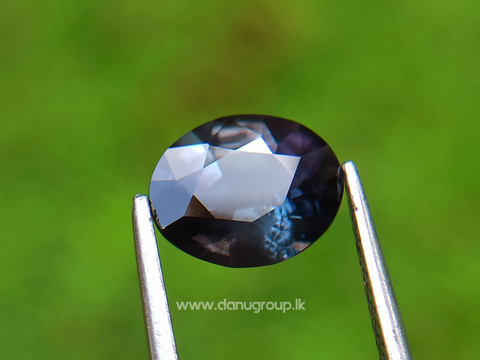 Dark purple sapphire oval shape 2 ct plus gem from Danu Group Gemstones Collections danugroup.lk