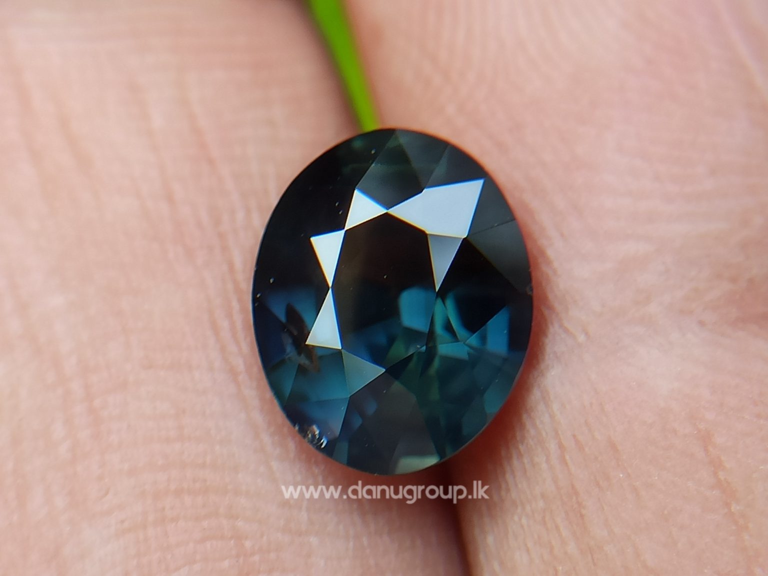 Dark Bluish Green Sapphire from Madagascar Danu Group Gemstones