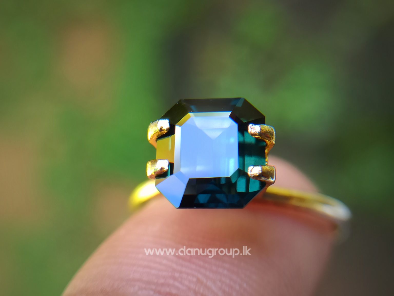 Natural Dark Green Sapphire Unheated Octagon shape stone from Danu Group Gemstones Collections