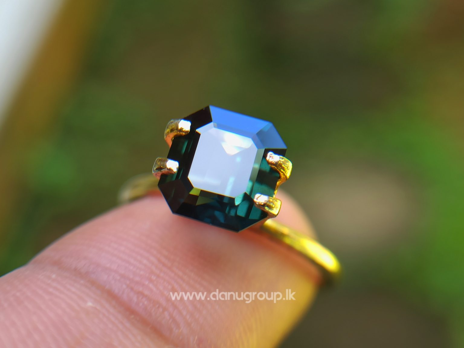 Natural Dark Green Sapphire Unheated Octagon shape stone from Danu Group Gemstones Collections