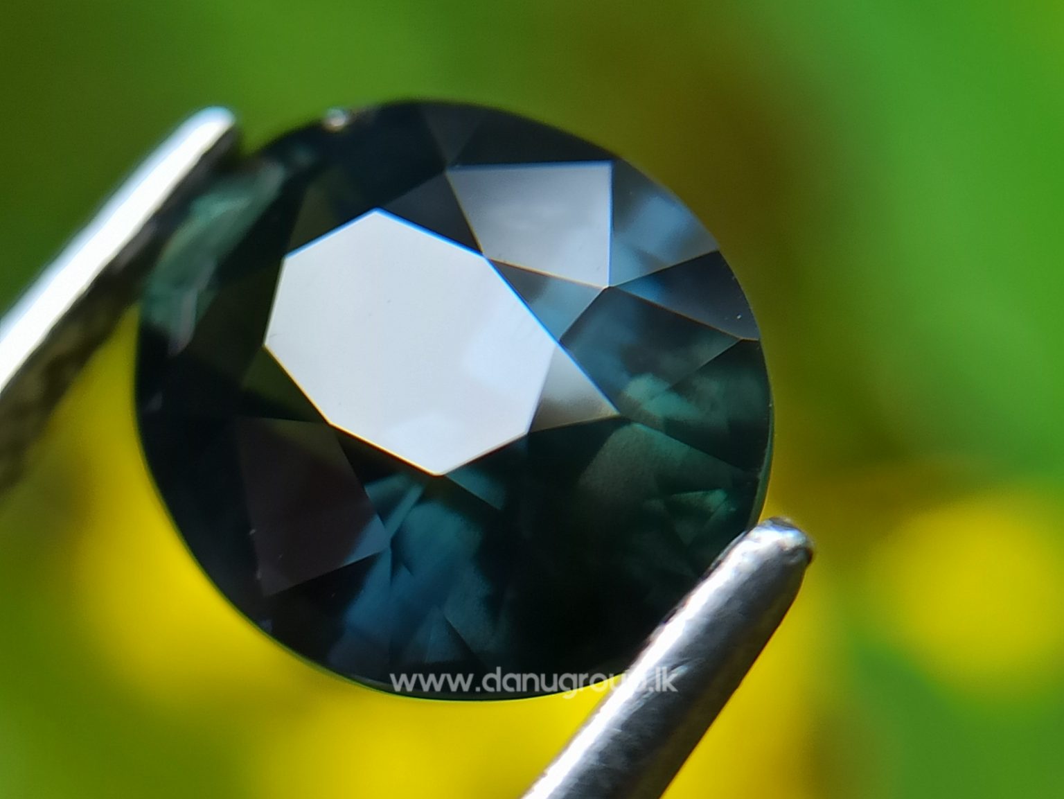 Dark Bluish Green Sapphire from Madagascar Danu Group Gemstones