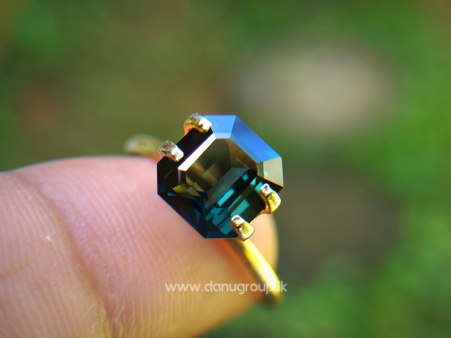 Natural Dark Green Sapphire Unheated Octagon shape stone from Danu Group Gemstones Collections