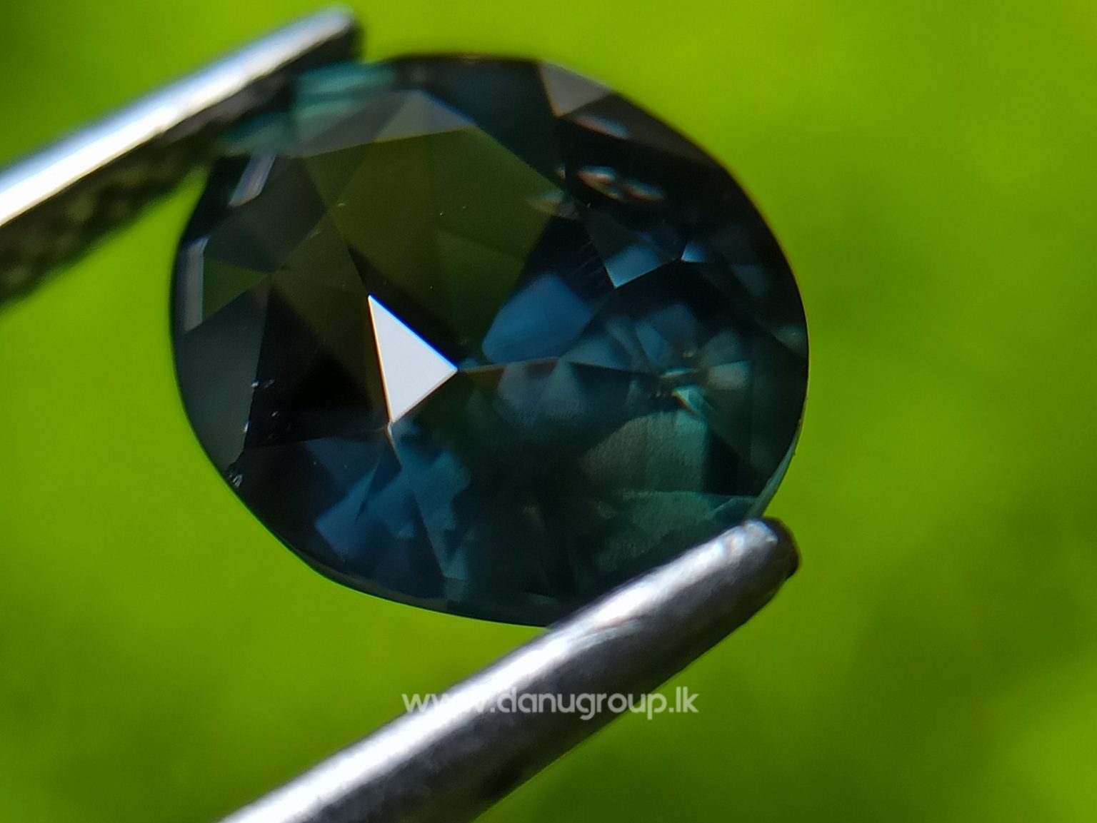 Dark Bluish Green Sapphire from Madagascar Danu Group Gemstones
