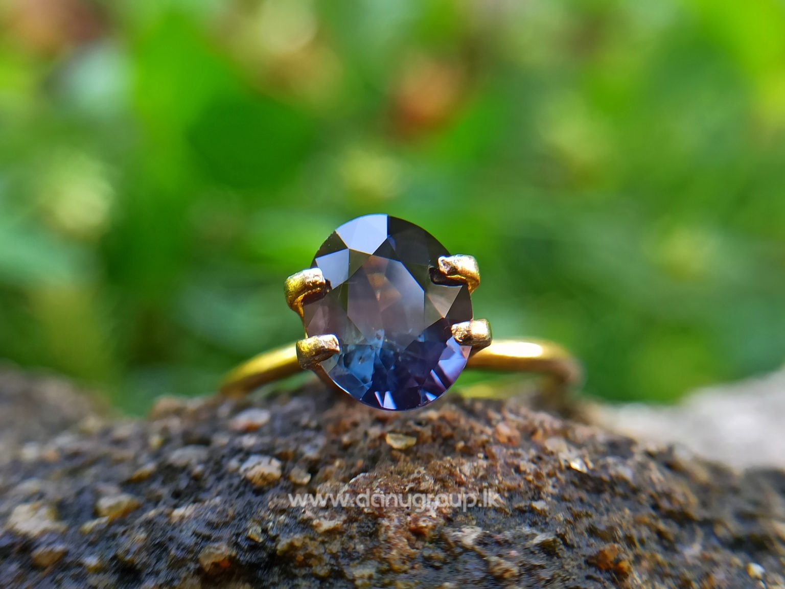 Dark purple sapphire oval shape 2 ct plus gem from Danu Group Gemstones Collections danugroup.lk