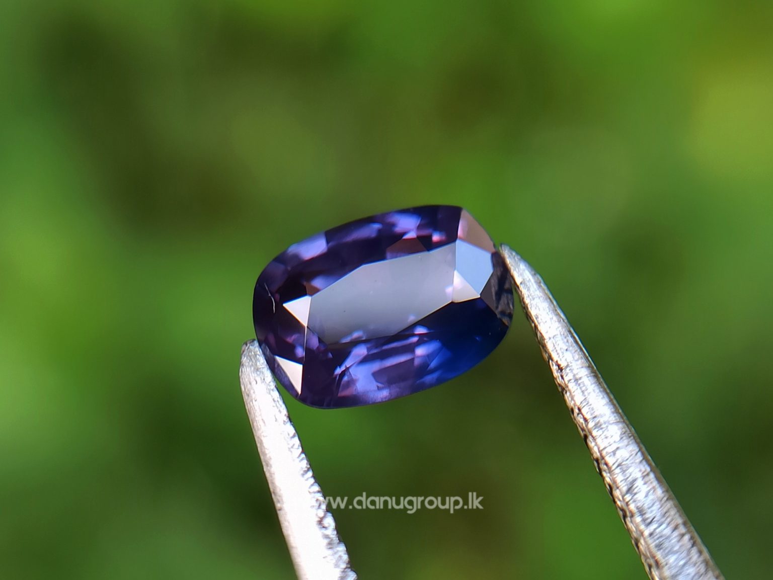 Ceylon Purple Sapphire with Blue color zoning Danu Group Gemstones from ceylon