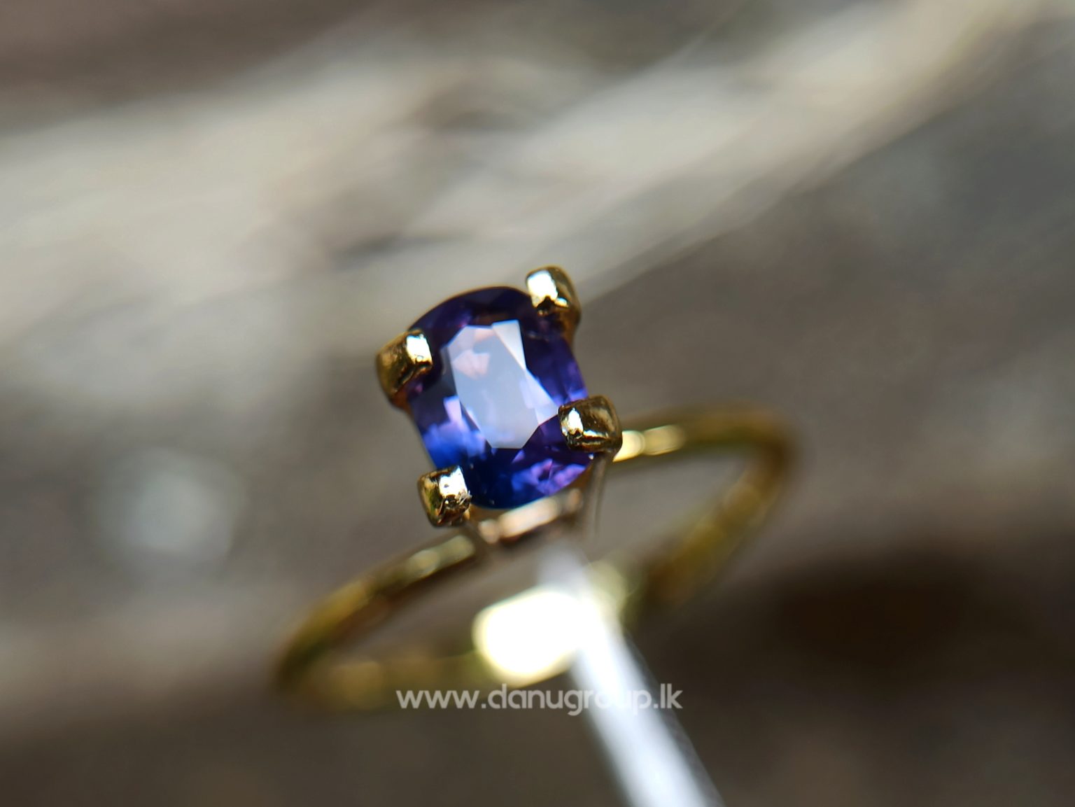 Ceylon Purple Sapphire with Blue color zoning Danu Group Gemstones from ceylon